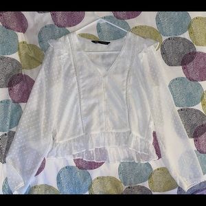 Zara blouse with polka dots, sleeves are slightly transparent.